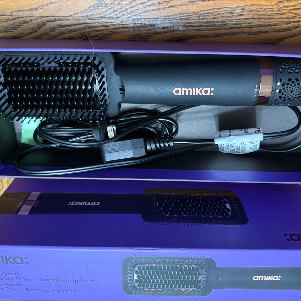 Amika Hair Dryer Brush in Black and Copper